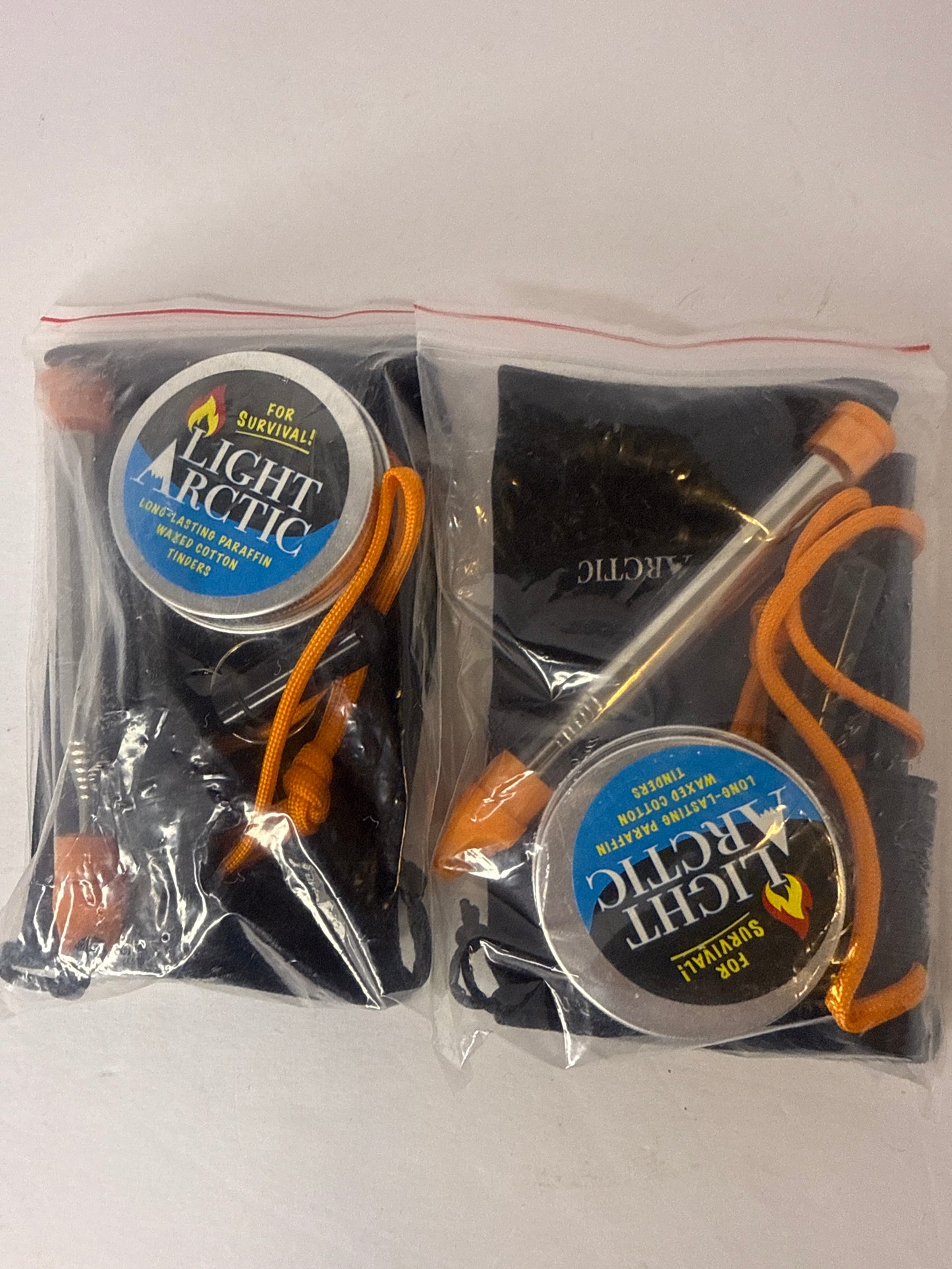 (2) Ferro Rod Fire Starter Kit Survival Gear by LightArctic: 7-in-1 Flint and Steel Includes Compass, Whistle, 11 pcs Waxed Tinders with Waterproof Capsule - Tested in The Most Extreme Weather Conditions