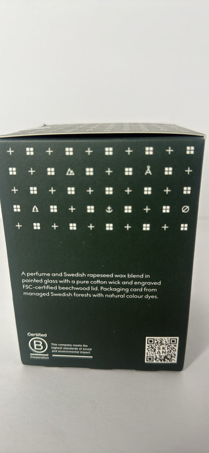 Skandinavisk Skog 'Forest' Scented Candle. Fragrance Notes: Pine Needles and Fir Cones, Birch Sap and Lily of The Valley. 7.0 oz. - Flip It Now