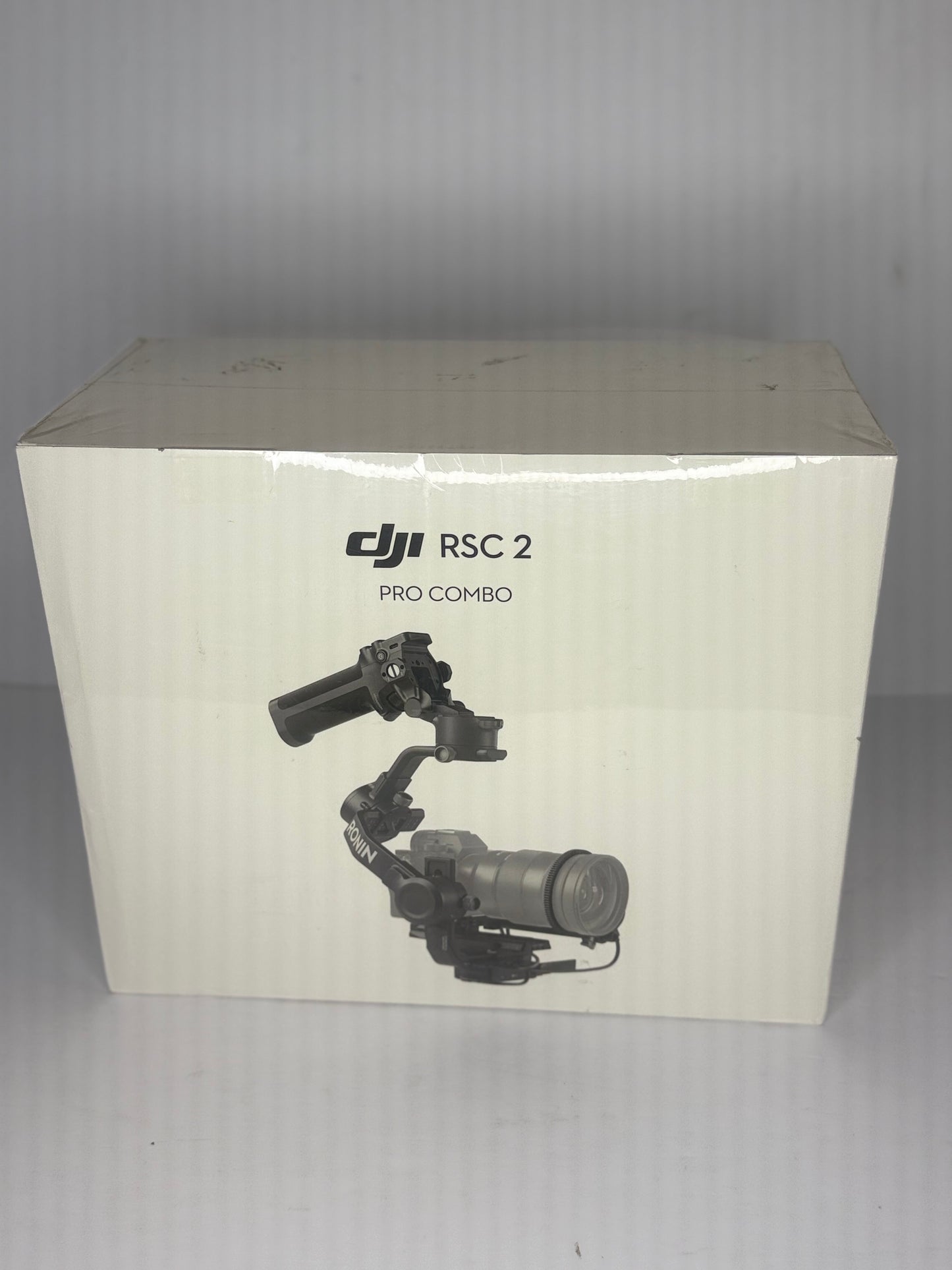 DJI RSC 2 Combo - 3-Axis Gimbal Stabilizer for DSLR and Mirrorless Camera, Nikon, Sony, Panasonic, Canon, Fujifilm, 6.6 lb Payload, Foldable Design, Vertical Shooting, OLED Screen, Black.